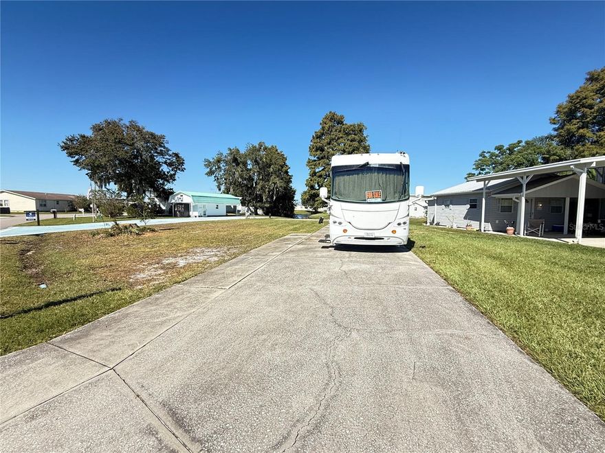 Welcome to a great community for Class A motorhome lovers! Check out this fantastic 81' x 162' waterfront lot in Phase 1 of Mount Olive Shores. This lot has a large concrete slab that fits any size Class A motorhome. You’ll enjoy full public utility hookups for a comfy stay. The Lot is also large enough to add a Manufactured Home and a Motorhome Port, giving you plenty of options. The HOA fee is a great deal; it covers trash pickup, basic lawn care, and maintenance of common areas. You also gain access to secure gates, a new 5,000-square-foot Community Center that is currently under construction, and a range of community activities. Mount Olive Shores is more than just a place to live; it’s a friendly gated community. It’s just minutes from I-4 and near many shopping spots and malls. Major medical facilities, Tampa, Orlando International Airport, and exciting attractions in Central Florida are all within an hour's drive. As a deed-restricted community for Class A motorhomes, Mount Olive Shores offers a unique lifestyle. To enjoy all the benefits of this community, you just need to own or lease a Class A motorhome for your first year. Don’t miss this great chance to make this welcoming community your home!