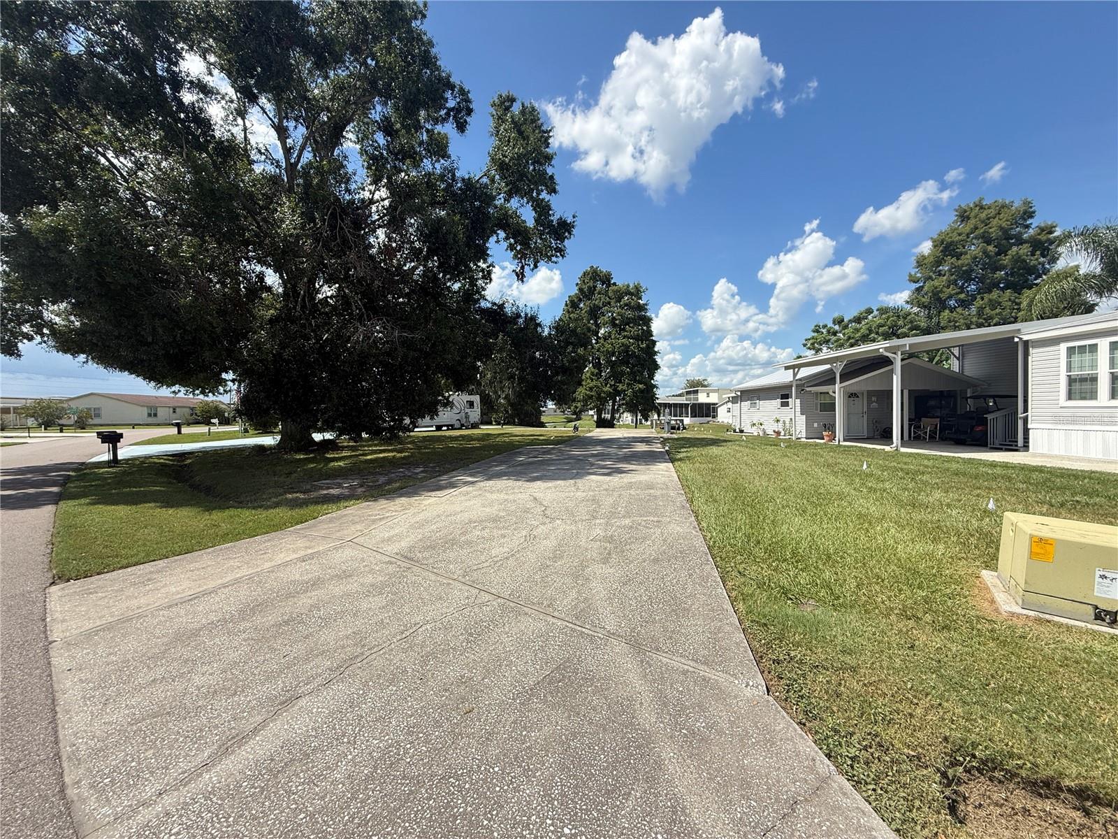 Welcome to a great community for Class A motorhome lovers! Check out this fantastic 81' x 162' waterfront lot in Phase 1 of Mount Olive Shores. This lot has a large concrete slab that fits any size Class A motorhome. You’ll enjoy full public utility hookups for a comfy stay. The Lot is also large enough to add a Manufactured Home and a Motorhome Port, giving you plenty of options. The HOA fee is a great deal; it covers trash pickup, basic lawn care, and maintenance of common areas. You also gain access to secure gates, a new 5,000-square-foot Community Center that is currently under construction, and a range of community activities. Mount Olive Shores is more than just a place to live; it’s a friendly gated community. It’s just minutes from I-4 and near many shopping spots and malls. Major medical facilities, Tampa, Orlando International Airport, and exciting attractions in Central Florida are all within an hour's drive. As a deed-restricted community for Class A motorhomes, Mount Olive Shores offers a unique lifestyle. To enjoy all the benefits of this community, you just need to own or lease a Class A motorhome for your first year. Don’t miss this great chance to make this welcoming community your home!