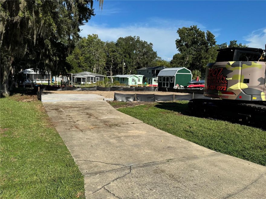 Build your dream home on Florida's Nature Coast. Weeki Wachee River Canal lot with 51 feet of waterfront and a newer concrete seawall! This lot is currently being split into two parcels, and we are selling the right side when facing the lot. The lot size will be 51 x 105(original lot size was 102 x 105). We are keeping the 2nd lot for our family. This area of Weeki Wachee does not have a homeowners association (HOA), meaning only county regulations apply, with no additional deed restrictions. As a result, you can keep boats, RV's, and commercial vehicles on your property or in your driveway. The area also permits short-term rentals if you're interested. Additionally, you can park an RV on the lot and easily connect it to power, water, and sewer(for 6 months or less). All usages and building regulations for the property are to be confirmed by the buyer with the county.