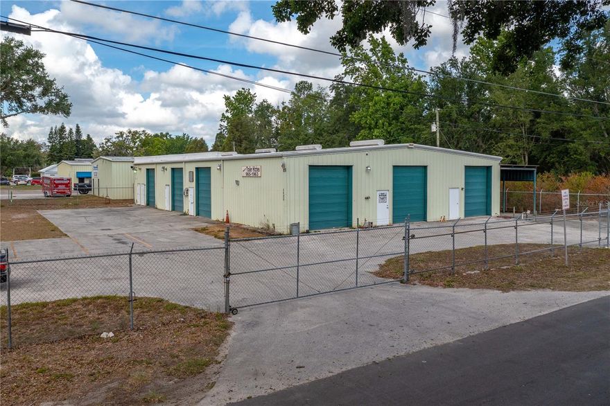 Conveniently located warehouse on just under half an acre with quick and direct access into Winter Haven, Auburndale and Lakeland. This warehouse totals 6,000 sq feet and offers 5 separate units with a public bathroom, as well as a covered bay at the back of the building. The three units on the South side of the building (facing K-Ville Ave) are each approximate 24ft x 59ft, have a 12ft roll up door and are each equipped with an office space (approximately 7ft x 17ft) with a separate exterior access. One unit also has a full bathroom with a shower, and another has counterspace and a sink in the back. There are two units on the East side of the building (facing Taylor Rd). One unit is approximately 19ft x 40ft with a single 12ft roll up door. The other unit approximately 24ft x 40ft with two 12 ft roll up doors. Both of these units have a regular door for access as well, but no office space. The ceiling height in the building is approximately 15ft. Each unit is equipped with 220Amp electrical. There is an air compressor at the back of the building that has lines running to each unit, except for one. The covered bay at the back of the building is approximately 15ft x 71ft and also has a 220Amp electrical hookup for an RV. The property is fully fenced with 2 sliding gates (one single and one double) off of Taylor Rd for access. This property has great income potential or could easily be opened up for a single company to use. (***NOTE: The car lift shown in a couple of the pictures does NOT convey.***)