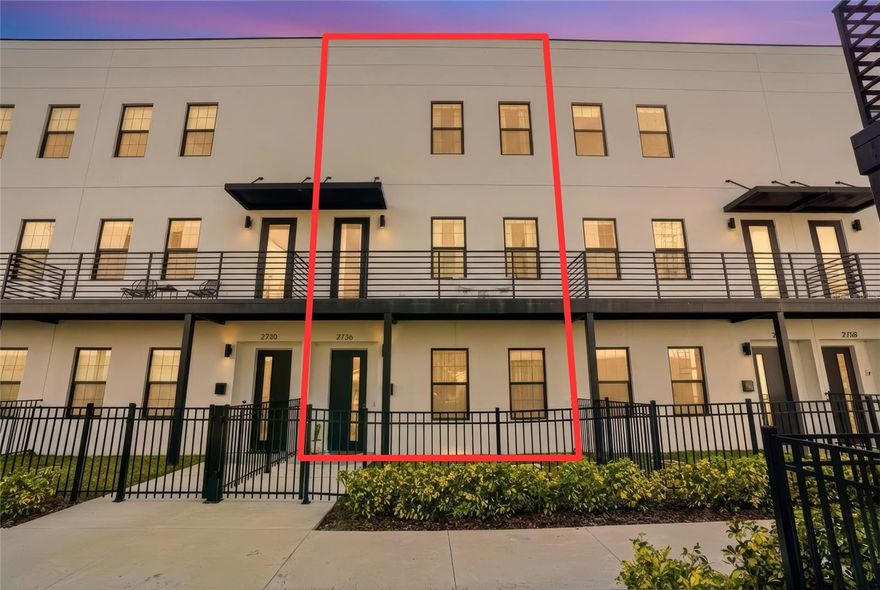 An architecturally driven townhome designed for those who value form, function, and location. The soaring ceilings, expansive windows, and striking exposed concrete walls set the tone throughout this home. This home is thoughtfully designed across three levels. The entry level welcomes you with polished concrete floors and a private ensuite bedroom ideal for guests, a creative studio, or a quiet home office. Upstairs, the main living level unfolds into a loft-style open concept space anchored by a chef-inspired kitchen featuring quartz countertops, white cabinetry, stainless steel appliances, and an oversized island with seating for effortless entertaining. A convenient half bath completes this level.

The top floor is dedicated to the owner’s retreat, a private sanctuary featuring a spacious, built-out walk-in closet and a beautifully appointed ensuite bath with dual vanities and clean, modern tile finishes. Washer and Dryer upstairs for connivence as well as the third bedroom and bath. 

Private fenced courtyards and balconies overlooking landscaped green space extend the living experience outdoors, creating rare breathing room in an urban setting.

In the heart of St. Petersburg’s Warehouse Arts District, an opportunity to live where creativity, culture, and modern architecture collide. Just blocks from Central Avenue’s Grand Central District, you’re steps from local favorites like Bandit Coffee, Urban Stillhouse, The Factory, St. Pete Athletic Club, breweries, galleries, and the Pinellas Trail, with downtown and the Gulf beaches only minutes away.

This exclusive 10-residence townhome community draws inspiration from the district’s iconic converted warehouses, blending industrial character with elevated, design-forward living.
Canvas WAD isn’t just a townhome, it’s a lifestyle defined by walkability, architectural edge, and access to one of St. Pete’s most vibrant cultural scenes.