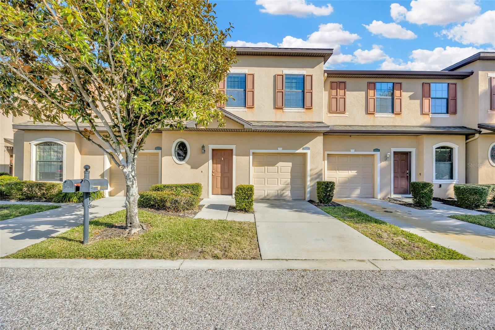 Welcome to West Bay Cove, a charming townhouse nestled in a small gated community in the heart of Tampa. This beautiful home offers a comfortable and convenient lifestyle with 3 bedrooms, 2.5 bathrooms, inside laundry room & a 1 - car garage. The open floor plan seamlessly connects the living room, dining area & kitchen, creating a spacious ambiance. There are granite countertops in the eat-in kitchen, 42" cabinetry & stainless steel appliances. Windows, sliding glass doors & entry door are storm rated. Ceilings are 9'4 on the lower level and 8' on the second floor. The great room sliding glass doors provide lots of natural lighting & lead out to the backyard patio area. Downstairs powder bath is off the kitchen & family room area. Upstairs you will discover the spacious primary suite with a walk-in closet & primary bathroom with dual sinks & granite countertops as well as a large walk-in shower. The two additional bedrooms on the 2nd level are well-appointed and share a hall bathroom. The laundry area is conveniently located between the bedrooms. Location is a short drive to local hospitals, shopping, restaurants, sports & concert venues, Tampa International Airport, Tampa Zoo, Busch Gardens & Downtown Tampa.