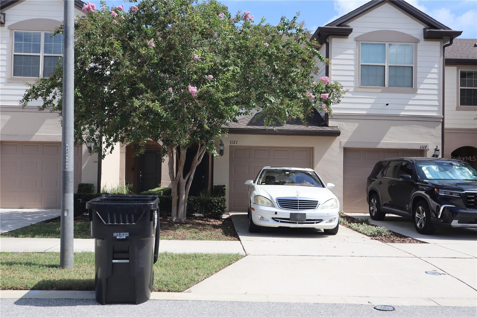 Don't miss this stunning townhouse with double primary bedrooms, 2.5 bathrooms, and a loft, located in the Crossing at Emerson Park. Situated in the heart of Apopka, this community is anchored by the leading medical industry and proposed commercial development, making it a prime spot in the growing city of Apopka. This beautifully designed townhouse features a spacious open floor plan with a gourmet kitchen that overlooks the living room. The kitchen boasts upgraded stainless steel appliances, solid wood cabinets, pendant lighting, granite countertops, and a beautiful tile backsplash. The living room is bathed in natural light from three 8-foot sliding glass doors, leading to a large screened-in lanai with private, relaxing views. Upstairs, you'll find 2 large primary suites with in-suite bathrooms and walk-in closets. The washer and dryer are conveniently located on the second floor. This private, gated community offers relaxing amenities, including a playground and a POOL. This community is just a mile from the new Florida Hospital campus. Enjoy easy access to major highways, with the new 414 on-ramp and Highway 429 nearby, placing Maitland, Altamonte Springs, Winter Garden, and Downtown Orlando just minutes away. In addition, the home is equipped with a fire suppression system throughout. Conveniently located near schools, Advent Health Hospital, and with easy access to Orlando's major suburbs, this well-maintained home is a must-see! This wonderful townhome can serve as your new Oasis or an investment property. The possibilities are endless.