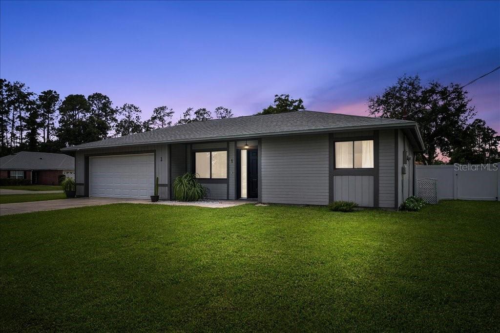 Welcome to this beautifully renovated home, perfectly situated on an extra-wide corner lot. Offering 3 bedrooms, 2 bathrooms, a covered patio, and a 2-car garage, this property boasts 1,481 sq. ft. of living space (2,407 total sq. ft.).
Step inside to a bright, open split floor plan with modern upgrades throughout. Recent improvements include a new roof (2023), AC system (2022), new air ducts, updated plumbing, and fresh interior paint. The kitchen is a showstopper with new cabinets, quartz countertops, stainless steel appliances (including a French-door refrigerator), stylish backsplash, and a sleek range hood.
The home features luxury vinyl plank flooring throughout, upgraded fans and light fixtures, and remodeled bathrooms with skylights that bring in natural light. Enjoy Florida living on the covered lanai, pavers on patio overlooking a beautifully landscaped fully fenced backyard (2022)—spacious enough to add your dream pool. A security camera system is also included for peace of mind.
Conveniently located in the heart of Palm Coast, this home is close to Palm Coast Pkwy, shopping, dining, schools, the new Advent Hospital, houses of worship, and just a short drive to US-1, I-95, Flagler Beach, and historic St. Augustine.
Don’t miss this move-in ready gem—schedule your private showing today