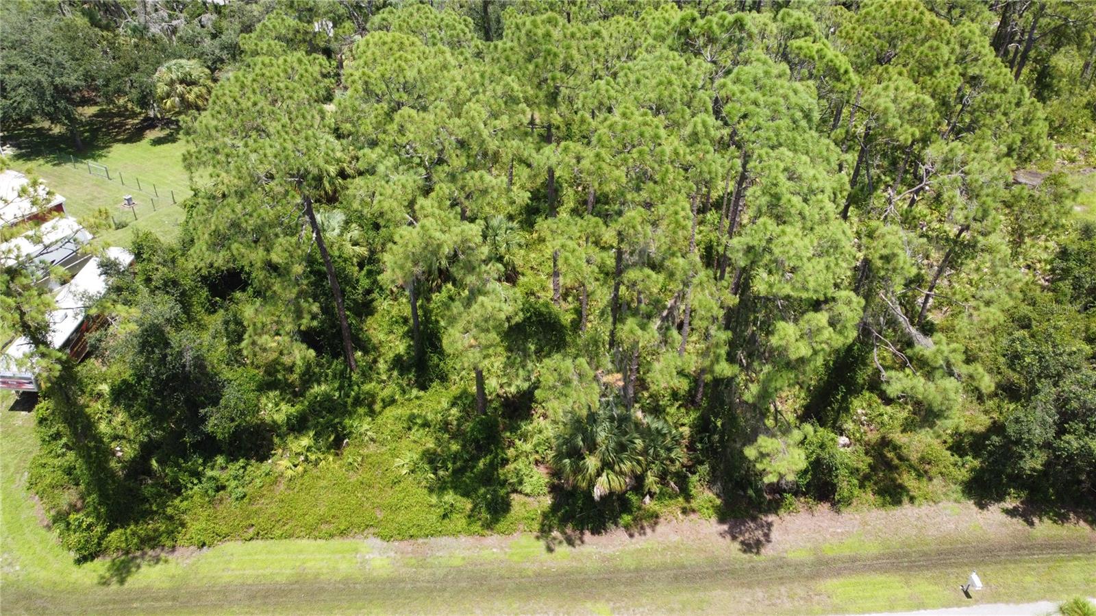 Discover the perfect location to build your dream home on this spacious vacant lot in a quiet, non-waterfront neighborhood. Enjoy the tranquility of this serene setting, while still being just minutes away from shopping and restaurants. With easy access to I-75, you'll have a convenient commute to nearby cities and attractions. This property offers the ideal blend of peace and convenience, making it a fantastic opportunity for your future home.
