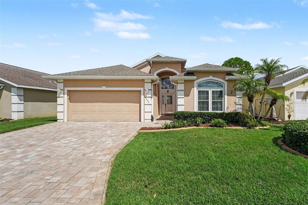 Photo of 302 High Vista Drive, Davenport, FL 33837 (MLS # TB8546285)
