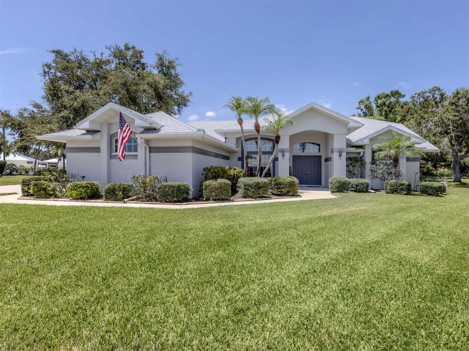 This beautifully maintained three-bedroom, two-bath home offers a spacious great room layout with soaring vaulted ceilings and an open-concept kitchen—perfect for both everyday living and entertaining. The updated primary bathroom features elegant quartz countertops and a walk-in shower, adding a touch of modern luxury. A large laundry room adds convenience, while a brand-new roof provides peace of mind. Nestled on a quiet cul-de-sac, the home also boasts a screened lanai with a sparkling swimming pool and a side-entry three-car garage. Located in a desirable community with low HOA fees, residents enjoy access to a clubhouse, fitness center, tennis courts, swimming pool, spa, basketball court, shuffle board and small library. .