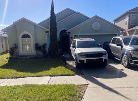 Photo of 7114 Moss Ledge Run, Land O Lakes, FL 34637 (MLS # A4711447)