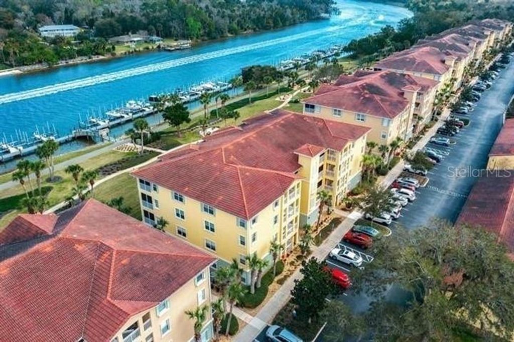 Photo of 700 Canopy Walk Lane #734, Palm Coast, FL 32137 (MLS # FC318718)