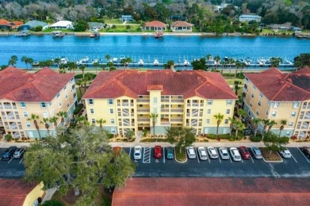 Photo of 700 Canopy Walk Lane #734, Palm Coast, FL 32137 (MLS # FC318718)