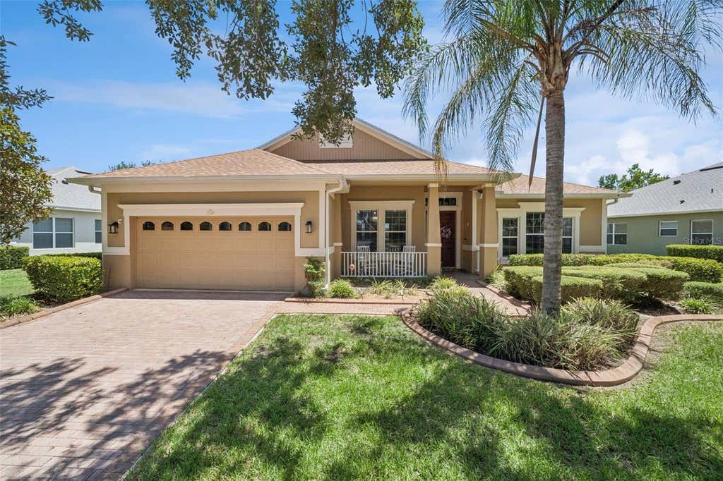 Photo of 220 Bayou Bend Road, Groveland, FL 34736 (MLS # O6428874)