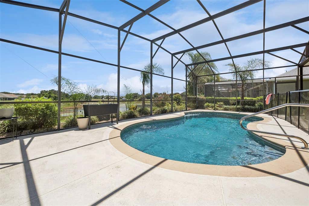 Photo of 220 Bayou Bend Road, Groveland, FL 34736 (MLS # O6428874)