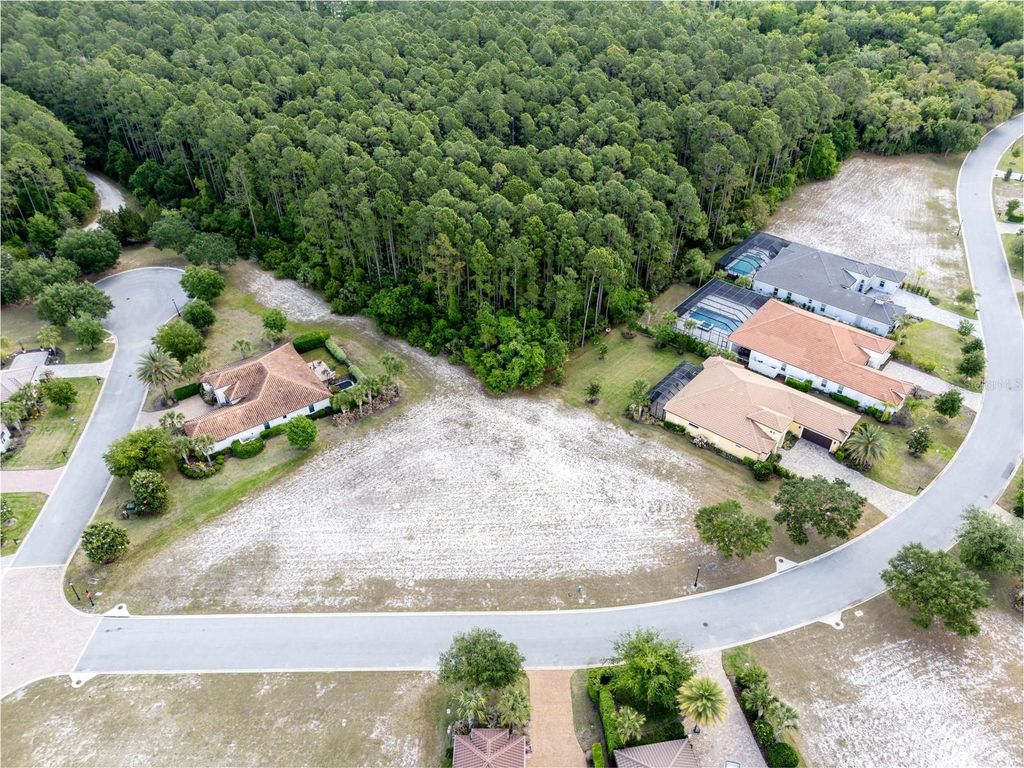 Photo of 515 Sweetgum Lane, Palm Coast, FL 32137 (MLS # FC318052)