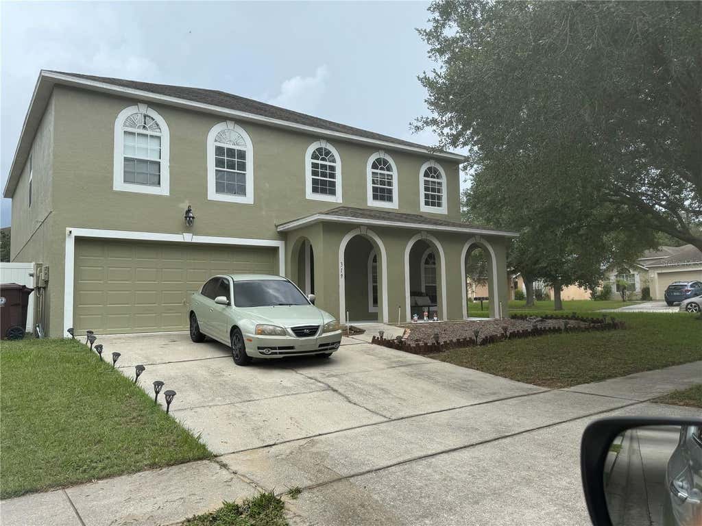 Photo of 319 Flint Street, Haines City, FL 33844 (MLS # S5154106)