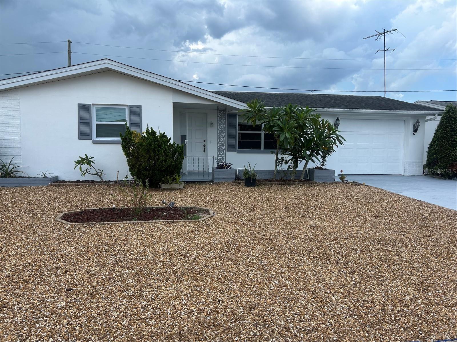 2 Bedroom, 1 1/2 Bathroom, 1 Car Garage home located in Holiday, FL. This property will be ready 8/22/25. Pets allowed with fees. Inside pics coming soon.