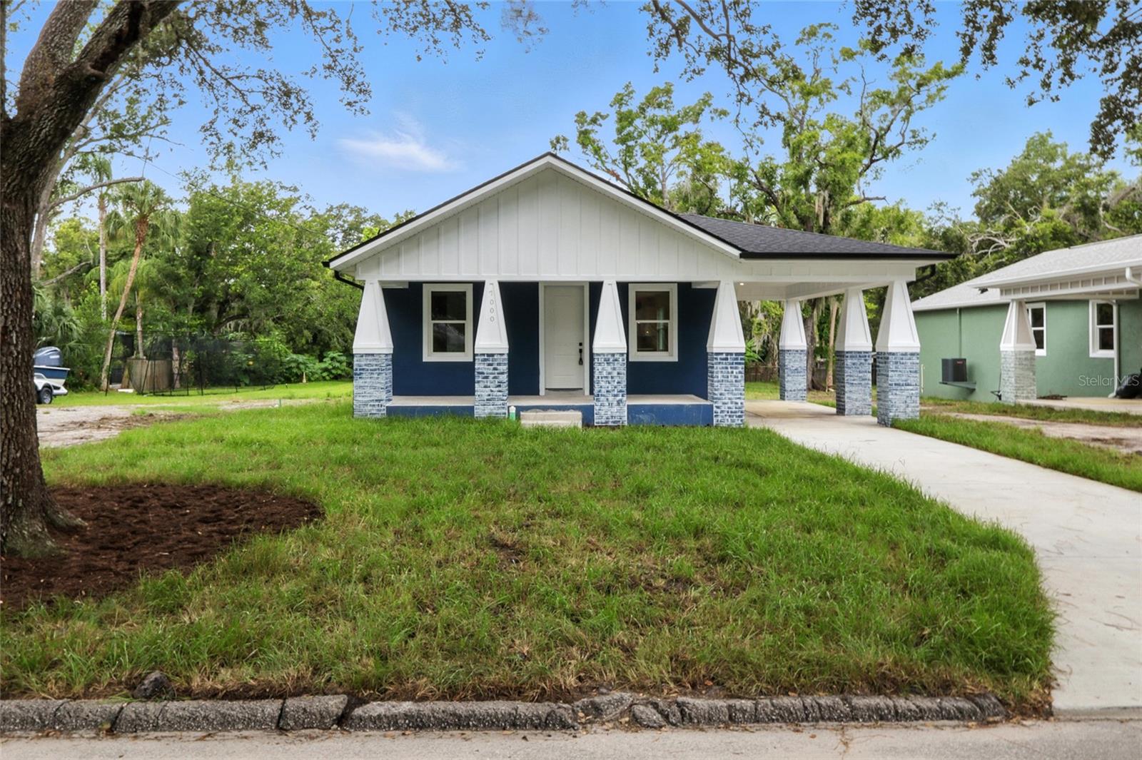 Charming NEW CONSTRUCTION bungalow in Old Seminole Heights
Welcome to this beautifully crafted 3-bedroom, 2-bathroom new construction bungalow located in the heart of Old Seminole Heights. Blending timeless charm with modern convenience, this home offers the perfect balance of comfort, style, and functionality. Not in a flood zone. Pets welcome with $200/pet non-refundable pet deposit.
Step inside to discover an open-concept layout filled with natural light, high-quality finishes, and thoughtful details throughout. The spacious living area flows seamlessly into a modern kitchen featuring brand-new stainless steel appliances, ideal for both everyday living and entertaining.
The primary suite includes a private en-suite bathroom with walk in shower, double vanities and generous closet space, while two additional bedrooms allows flexibility for guests, home office, or family needs. Both bathrooms are outfitted with contemporary fixtures and elegant tile work.
Enjoy your morning coffee or evening unwind on the welcoming front porch or the peaceful back porch overlooking the large backyard perfect for outdoor gatherings, gardening, endless possibilities. A convenient carport adds extra functionality and protection from the Florida weather.
Located just minutes from local eateries, craft breweries, parks, and downtown Tampa, this home offers the best of Seminole Heights living in a low-maintenance, move-in-ready package. Everything is brand new from the foundation to the roof giving you peace of mind for years to come. Don't miss the opportunity to live in a new construction in one of Tampa's most vibrant and historic communities!