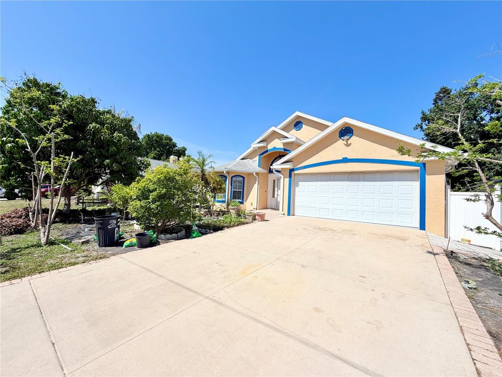 Photo of 1150 Oakwood Drive, Dunedin, FL 34698 (MLS # TB8501376)