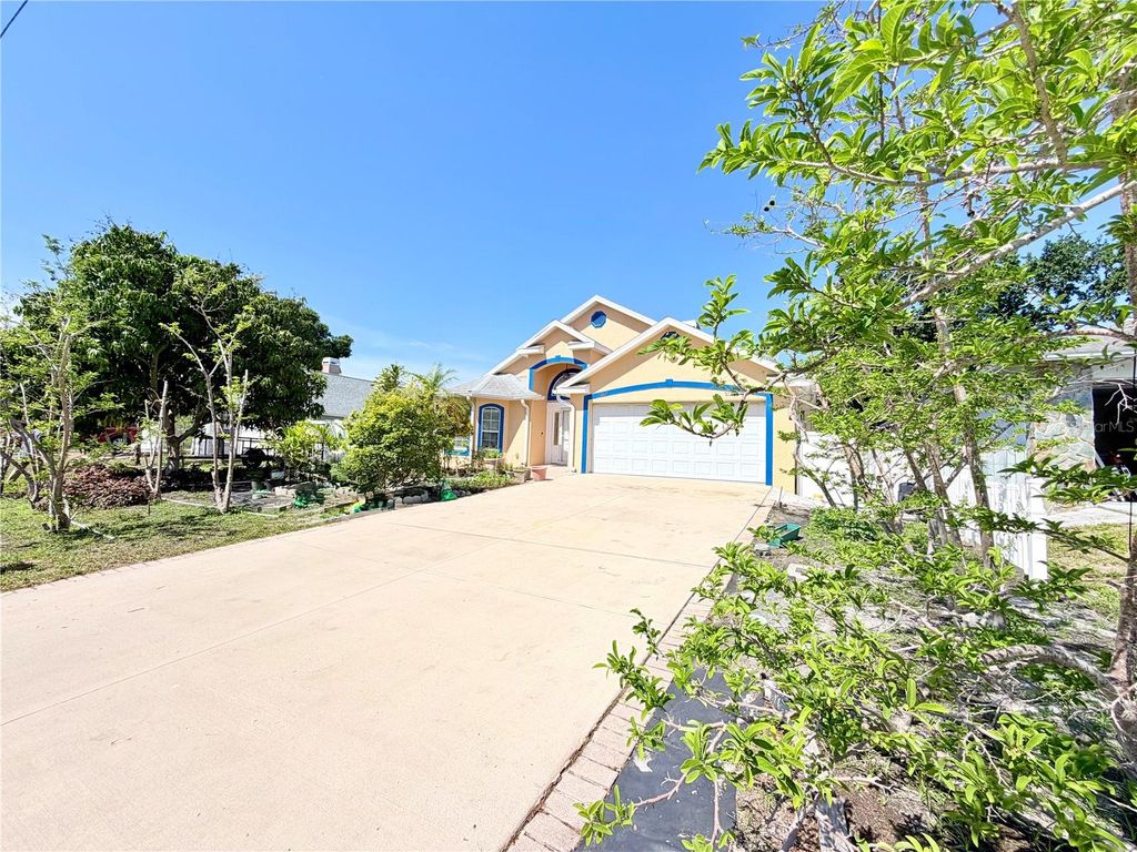 Photo of 1150 Oakwood Drive, Dunedin, FL 34698 (MLS # TB8501376)