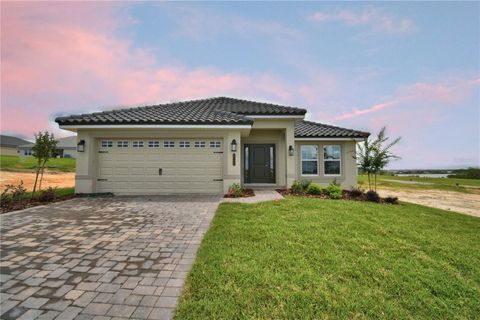 Photo of 5409 Waterside Drive, Auburndale, FL 33823 (MLS # L4953665)