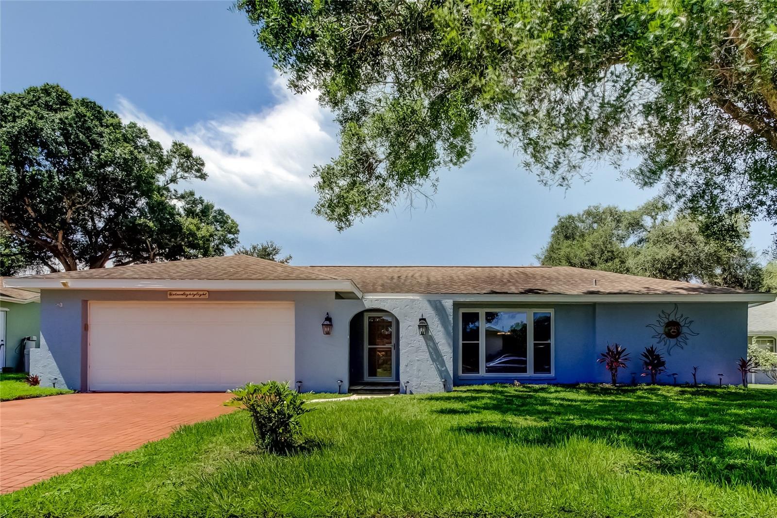 Welcome to your Clearwater oasis on Eden Court! This beautifully updated 4-bedroom, 2-bath pool home with 1,763 square feet and a 2-car garage is move-in ready and full of upgrades. The completely remodeled kitchen features wood cabinetry, granite countertops, and all-new stainless steel appliances. The primary bathroom has been tastefully renovated, and the second (pool) bath features a new vanity and toilet. Additional updates include a new electrical panel (2021), most windows new with impact-resistant windows (2021), water heater (2019), new ceiling fans, crown molding, and luxury vinyl plank flooring in many rooms. The split floor plan offers ideal privacy for families or guests. Enjoy your morning coffee or a good book in the enclosed sunroom, or step outside to a spacious backyard retreat with a saltwater pool, vinyl fencing, and a handy storage shed. Fresh exterior paint gives this home great curb appeal. All of this, just minutes from Clearwater’s beaches, shopping, and dining. Don’t miss your chance—schedule your private showing today!