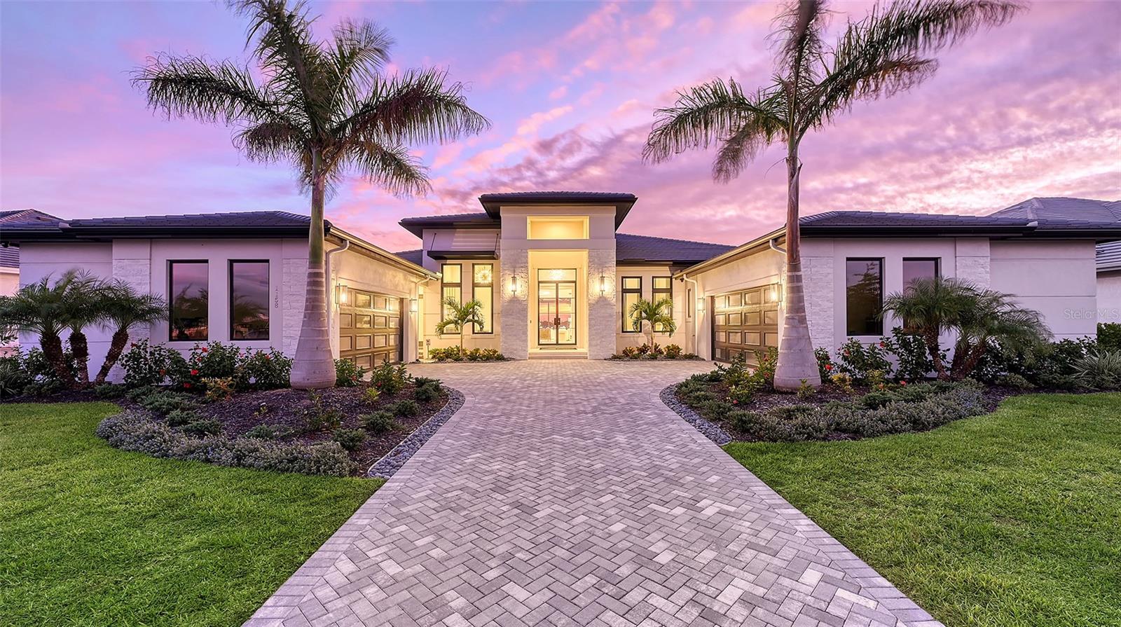 Pre-Construction. To be built. Build your custom home by renowned Anchor Builders and enjoy a rare opportunity to build your dream estate in this exclusive gated community on a panoramic .51 acre homesite with preserve views. This homesite in the exclusive enclave of Nicklaus Manor in The Concession. Beacon Park Place is a premier cul-de-sac with the only paver brick road in The Concession. Martinique II is the grand approach to this one-of-kind transitional home and is highlighted by towering columns finished in Artic Hewn stonework and a horizontal louver shutter. A wide paver driveway accented with artistic landscaping provides easy ingress and egress to the oversized 4 car garages. The moment you step from the paver grand entry through the custom iron 10 feet high doors, your immediate sense of arrival is that of a calming, welcoming and inviting feel of sanctuary. Your attention is immediately captivated by the uninterrupted sightline from the foyer where you will welcome your guests to the spectacular preserve view that elevates the tranquil and welcoming feel. The grand room features vaulted ceilings with stained wood beams connected with wide galleries which invite you to each space with a beautiful blend of elegant, but soothing colors and textures. This comfort and warmth transcend throughout the owner's suite, fitness room, study, three ensuite guest bedrooms, powder bath, and generously appointed outdoor living-dining-pool area that blend seamlessly with the indoor spaces.
Survey and geotechnical reports already prepared for the buyer. The Concession features an unparalleled Jack Nicklaus golf course co-designed in association with Tony Jacklin - the only one of its kind on Florida's Gulf Coast! Ranked one of the best private golf clubs in the country and infamous as the home to the World Golf Championship PGA golf tournament in 2021, the World Champions Cup in December 2023, 2025, and 2028, the 2015 Men’s and Women’s NCAA Division I championships and the biennial Concession Cup. In addition, enjoy world-class dining at The Bistro dining and the wine list is deeply diverse (365 selections, a multitude in the 90+ point range) representing a broad spectrum of wines from around the world, including a Captain’s List that contains perhaps the largest collection of perfect and near-perfect scoring wines in the area.
Beyond the gates, The Concession is a short drive to a plethora of dining, shopping, polo, events and entertainment in the vibrant Lakewood Ranch and UTC area, and near the enriching culture and beaches of Sarasota.
Some features shown in the photos are optional and not included in the list price.