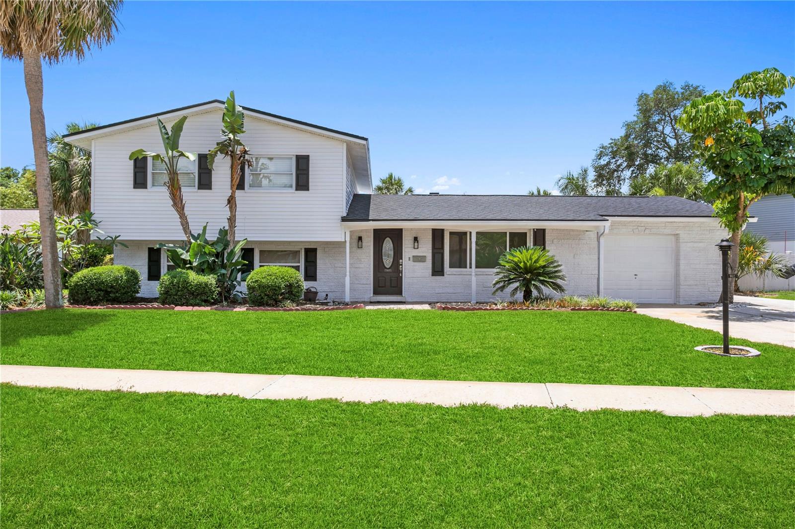 Updated Tropical Tri-Level - 4bd, 4ba, 1-car garage, resort-style pool home with tons of space for entertaining!!! Interior features main living room, huge bonus Florida room over looking the pool adorned with tropical palms offering a resort style ambiance. Additional spacious living area can serve as a private in-law suite, with loads of storage space, office/bedroom and full bath. The oversized fenced in lot offers plenty of outdoor entertaining or relaxation around the stunning FiberTech finished concrete pool, with new pump. Covered and uncovered patio space makes this a true Floridan tropical oasis. Oversized driveway can easily accommodate a boat or RV. Community water access via boat ramp is a Baycrest Community perk! Other desired features inside home includes new cabinetry, floors, light fixtures and bathroom fixtures. Home has an open layout downstairs, wood stairs leading to large second floor primary bedroom and bath, adjacent to large 2nd and 3rd bedrooms. New roof in 2023, New HVAC in 2023, New Insulation in 2023.
Close proximity to interstates, TIA (airport), Downtown Tampa, & beaches.