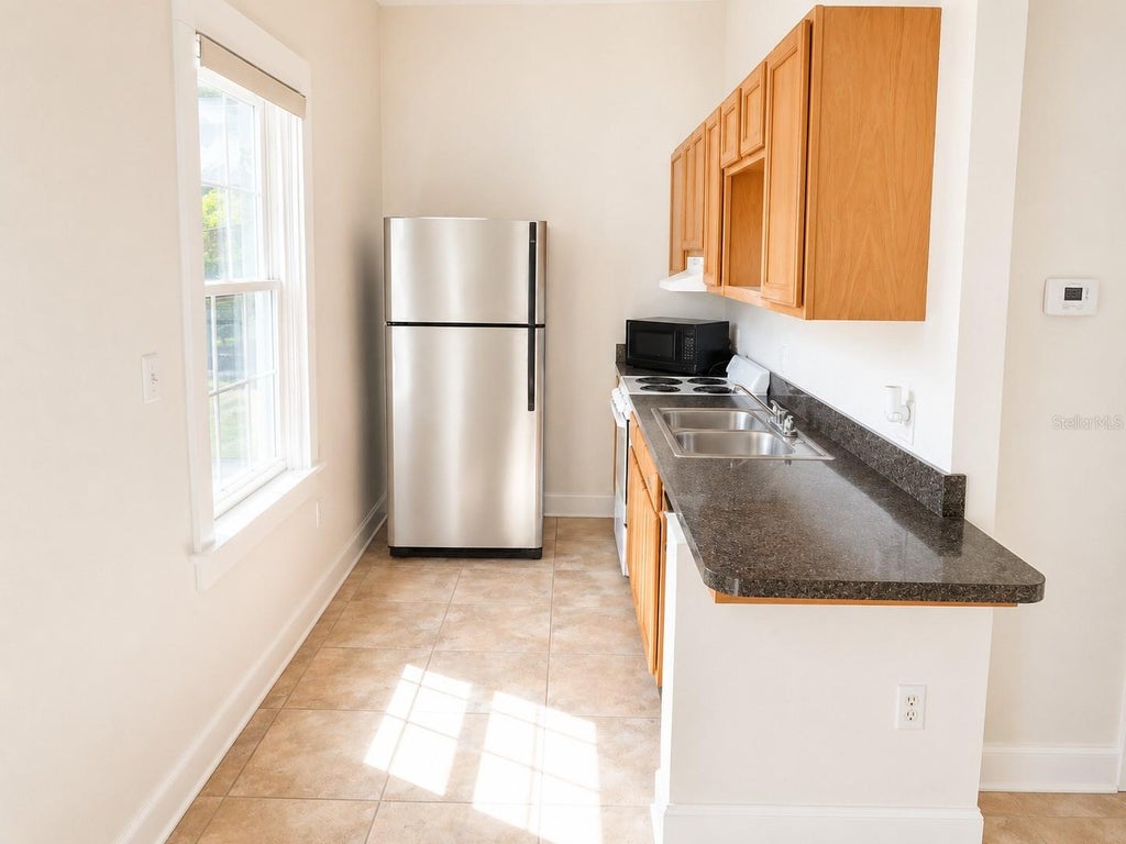 Photo of 22 S Clyde Avenue #4, Kissimmee, FL 34741 (MLS # S5158300)