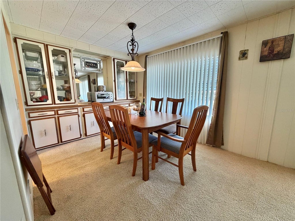 Photo of 113 Pyracantha Lane, Leesburg, FL 34748 (MLS # G5118499)