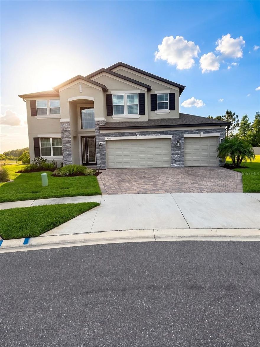 One or more photo(s) has been virtually staged. Welcome to this stunning 5-bedroom, 5-bathroom home now available for sale in one of Wesley Chapel's most sought-after communities. Spanning an impressive 3,761 square feet, this residence blends spacious living with modern comfort, creating the perfect backdrop for everyday life and entertaining alike. Head outside to discover the showstopping feature — an oversized, extended screened lanai totaling 1,200 square feet with elegant light pavers. This expansive outdoor retreat is ideal for dining al fresco, hosting gatherings, or enjoying the protected space. Beyond the lanai, breathtaking panoramic water views deliver a sense of serenity that transforms every evening into a peaceful escape. The neighborhood offers an exceptional lifestyle with resort-style amenities just minutes away. The renowned Epperson Lagoon provides crystal-clear waters and tropical vibes, while the nearby playground and dog park ensure fun for all residents. Convenient parking and a well-designed driveway make daily routines effortless. Everyday essentials are wonderfully close, with Publix Super Market and Starbucks located less than two miles from your front door. Residents will appreciate proximity to top-rated schools, including Kirkland Ranch K-8 and Kirkland Ranch Academy of Innovation, both within a short drive. Surrounded by lush Florida greenery and a welcoming community atmosphere, this home delivers the rare combination of tranquil surroundings and modern convenience. Schedule your private showing today!
