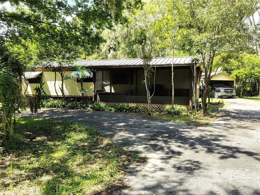 This home is situated on an oversized lot in an established neighborhood known for its quiet streets and community charm. It requires repairs, updates, and cosmetic improvements, presenting an excellent opportunity for buyers interested in renovation or investment projects. While the home needs work, it offers strong potential given its location and lot characteristics. Its location boasts extreme convenience being just minutes away, you'll find multiple boat ramps that provide easy access to Lake Panasoffkee-renowned for some of the best fishing in Florida. The lake flows into the scenic Withlacoochee River, where you can enjoy boating, kayaking, and the view of an abundance of native wildlife. Enjoy the small-town charm while still being just minutes from The Villages that hosts free nightly entertainment, golf courses, shopping, dining, and much more! You're also close to Florida’s west coast, offering waterfront dining, kayaking, fishing, beaches, and natural springs for the perfect weekend adventures. Convenient access to I-75 and the Florida Turnpike makes travel to Orlando’s theme parks and major airports a breeze. This home gives the perfect blend of comfort, privacy, and convenience to the Florida lifestyle. So, bring your imagination as it needs some love, elbow grease, and a good toolbox.