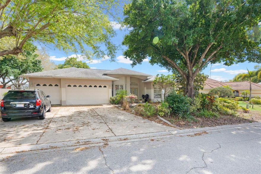 Your Waterfront Dream Awaits! This is a rare opportunity to secure a prime waterfront estate in the highly sought-after River Woods neighborhood at an unbeatable price. In a quiet neighborhood surrounded by large majestic trees and lush Florida landscaping, the property benefits from generous spacing between homes, creating a sense of tranquility without feeling isolated. This 3 car garage pool home, with waterfront views is sure to impress!  The flowing floor plan includes a spacious primary suite featuring private slider access to the screened-in pool area. As soon as you walk in the front door you will see straight through to the pool area which is overlooking the large pond! Step outside to a massive lot and a newly refinished pool, all overlooking serene water views. With just a few cosmetic touches, this home will be the absolute crown jewel of the community! River Woods residents enjoy access to a community center with fitness equipment, a resort-style pool, tennis and pickleball courts, beautiful tree-lined streets, and NO CDD FEES! Newer roof in 2018 and newer LVP flooring throughout!