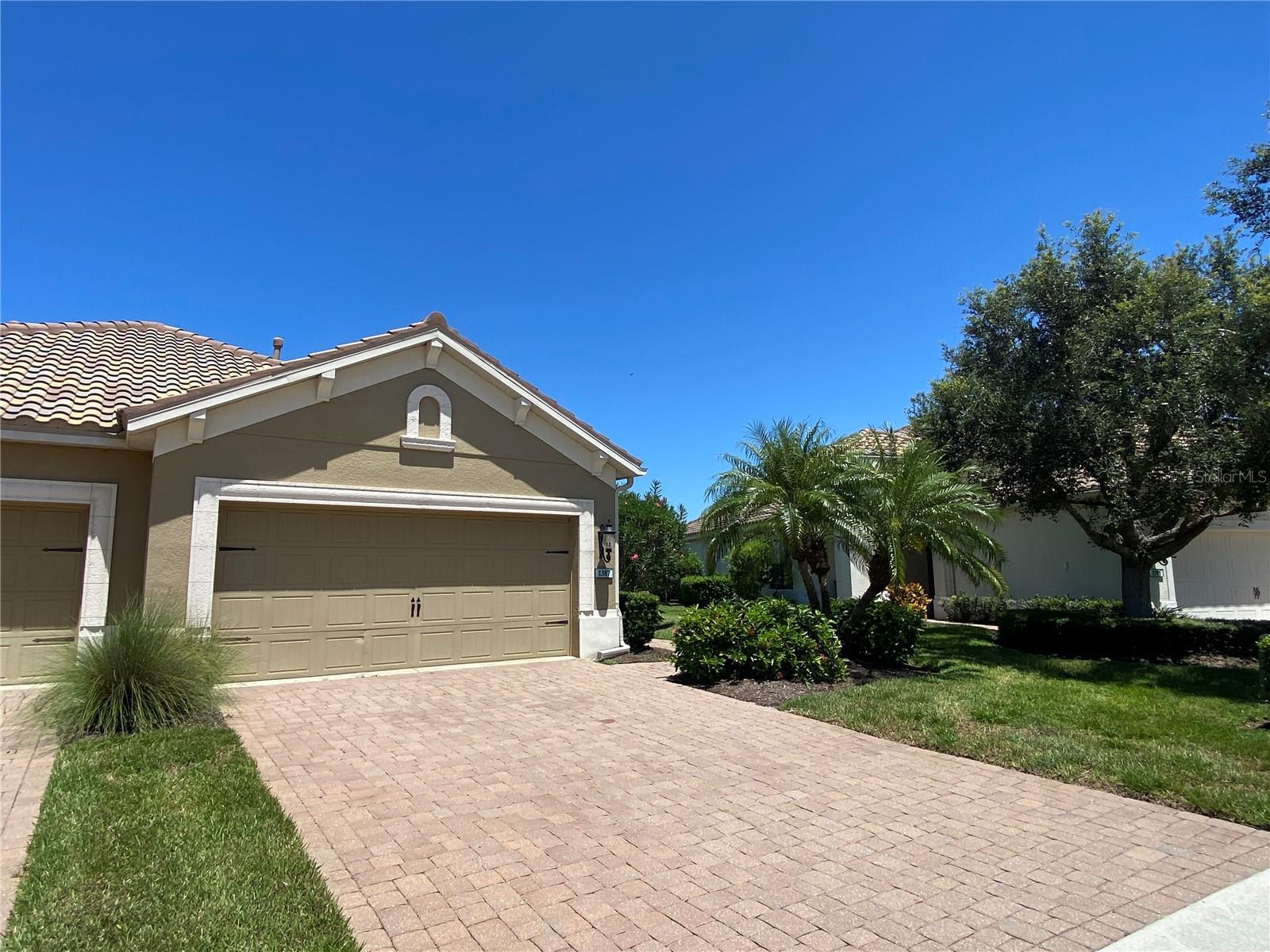 Welcome to easy, tropical living in the desirable Boca Royale Golf & Country Club, A Maintenance-Free Living Community in the Gated Boca Royale Golf & Country Club! A gated, beautifully landscaped community
This 2-bedroom, 2-bath villa with a Den/Study/Office offers a smart layout and plenty of space in a lush, private setting. Start your mornings on the inviting front porch nestled among mature landscaping, or unwind on the screened lanai overlooking a peaceful pond.
Inside, enjoy neutral tile laid throughout the main living areas and cozy carpet in the bedrooms. The spacious kitchen features maple wood cabinets, a large granite island, a gas range, under-cabinet lighting, and a closet pantry—perfect for both everyday living and entertaining.
The Den/Office makes a great home office, reading room, or optional guest space.
The private primary suite includes two closets, dual vanities, and a walk-in shower (no tub).
Additional highlights:
Interior laundry room with  washer & dryer
Hurricane shutters
2-car attached garage
Blinds throughout
Located in the Martinique neighborhood of Boca Royale, residents enjoy sidewalks, a community pool, spa, and BBQ area—perfect for relaxing afternoons with neighbors and friends.
HOA fees cover:
Lawn care
Irrigation
Trash
Sewer and irrigation water
For those seeking an active lifestyle, optional memberships are available for golf, fitness, and racquet sports.
Boca Royale is known for its mature tropical landscaping, beautiful golf course views, and active social scene. The on-site restaurant is open to the public, and the location is just minutes from Manasota Key, Gulf beaches, shopping, and dining.
Flood Zone X = no flood insurance required for mortgages (optional for added peace of mind).