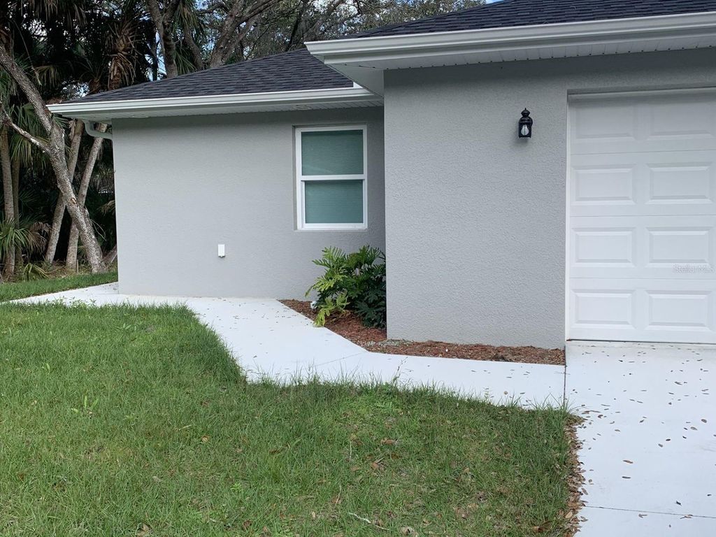 Photo of 104 Farber Street, Port Charlotte, FL 33953 (MLS # D6143189)