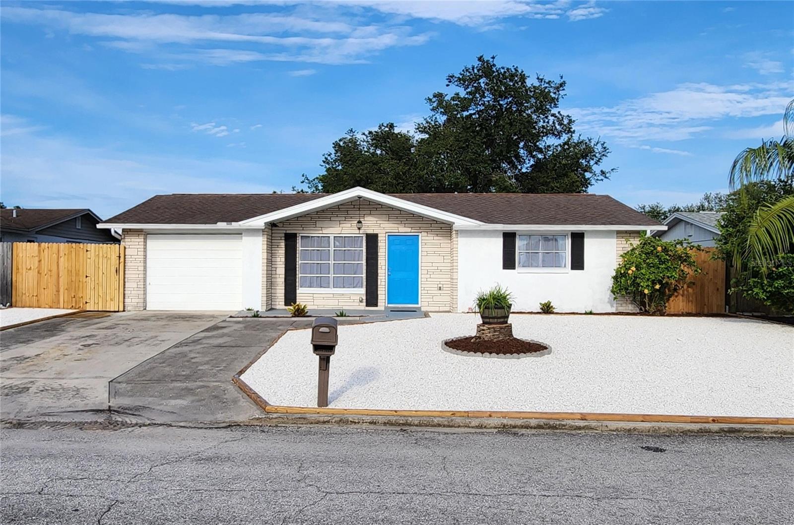Well maintained, ready to move in home in Palm Terrace Gardens -- Located in a NO FLOOD ZONE with NO HOA -- Quiet neighborhood with good neighbors -- Air conditioning system replaced 2022 -- New roof installed 2017 with 22 years remaining life -- New electrical breaker box 2022  -- Water heater replaced 2023 -- Updated kitchen 2023 - extended counter, added dishwasher, installed over-range microwave  -- Updated bath 2023 - vanity, tub/shower, toilet -- Just installed new farmhouse sink and refreshed paint throughout -- Nice size Florida room - lots of windows for natural light -- Oversized 1-car garage with automatic opener -- All new front landscaping -- Fenced backyard has large shade tree with swing -- Fenced side yard -- Screened lanai