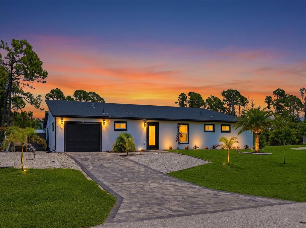 Photo of 1458 E Hallmark Boulevard, North Port, FL 34288 (MLS # A4699586)