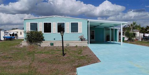 Photo of 1451 Blue Heron Drive, Englewood, FL 34224 (MLS # D6147017)
