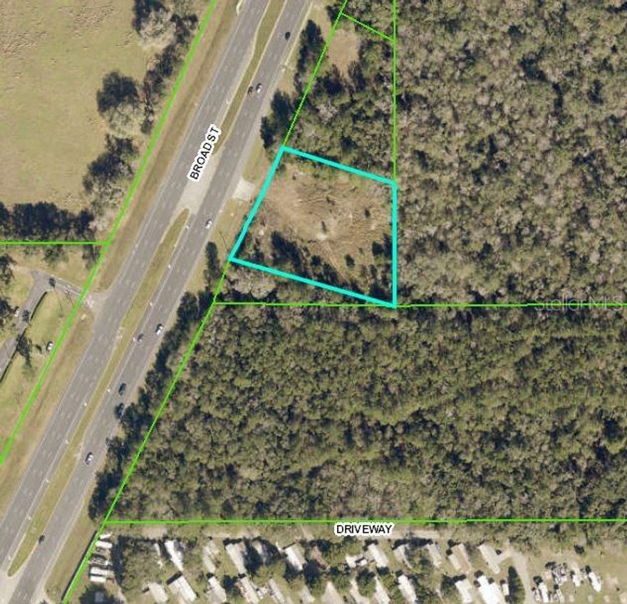 Great business building opportunity in a growing area on 1.40 acres. Right off a paved main road. Very visible when traveling down Broad St. Backs up to land that has been zones for commercial retail space and multi family units. This lot is Zoned CPDP. Buyer to verify all zoning and building questions with the county.
