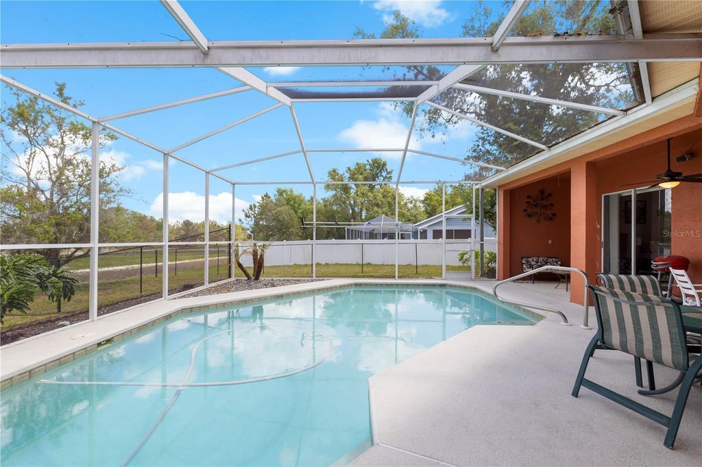 Photo of 3051 Waterfall Drive, Spring Hill, FL 34608 (MLS # W7885050)