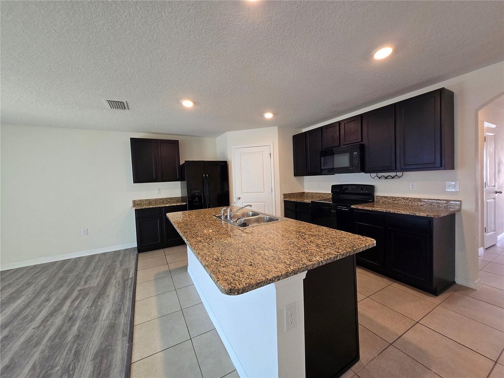 Photo of 887 NW 250th Drive, Newberry, FL 32669 (MLS # GC544076)