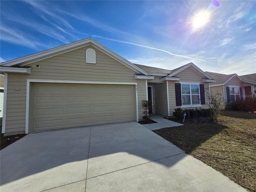 Photo of 887 NW 250th Drive, Newberry, FL 32669 (MLS # GC544076)