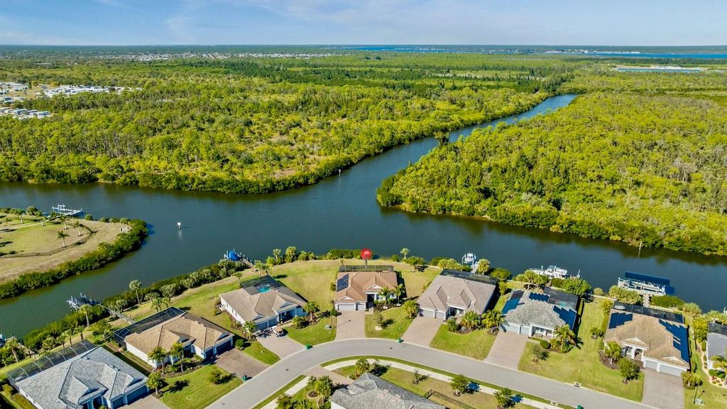 Photo of 15080 Spanish Point Drive, Port Charlotte, FL 33981 (MLS # C7519611)