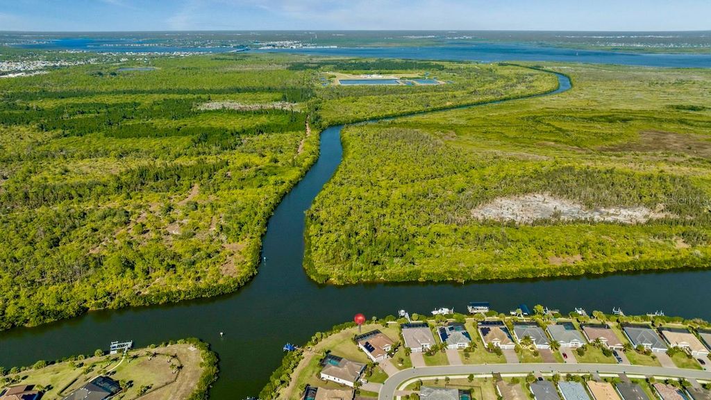 Photo of 15080 Spanish Point Drive, Port Charlotte, FL 33981 (MLS # C7519611)