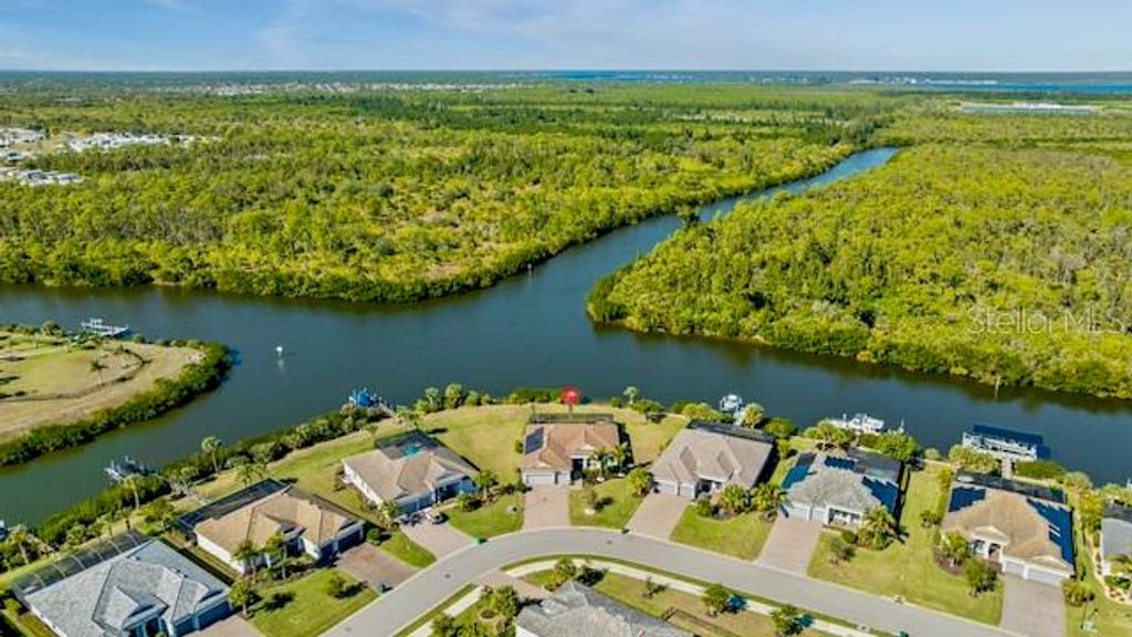 Photo of 15080 Spanish Point Drive, Port Charlotte, FL 33981 (MLS # C7519611)