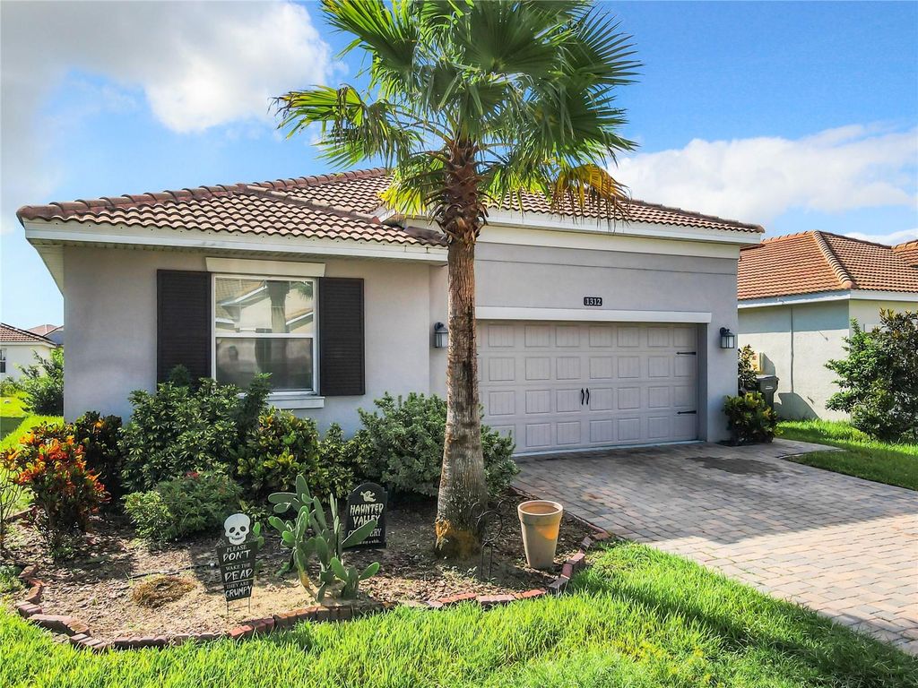 Photo of 1312 Oak Crest Street, Davenport, FL 33837 (MLS # O6353684)