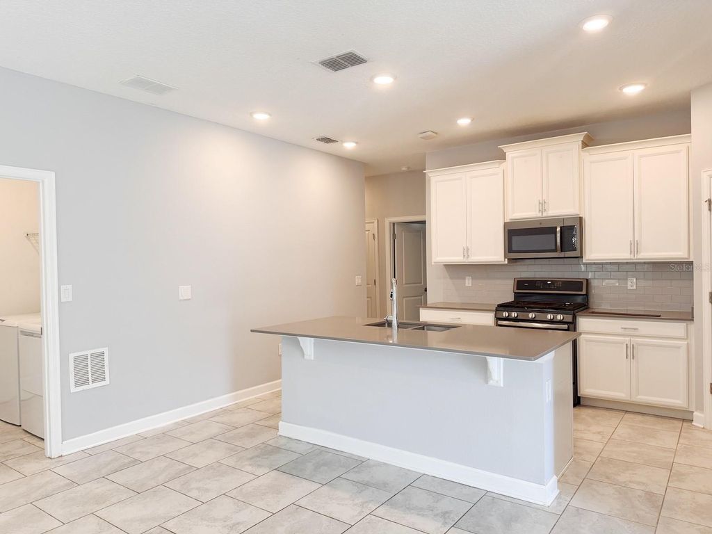 Photo of 1312 Oak Crest Street, Davenport, FL 33837 (MLS # O6353684)