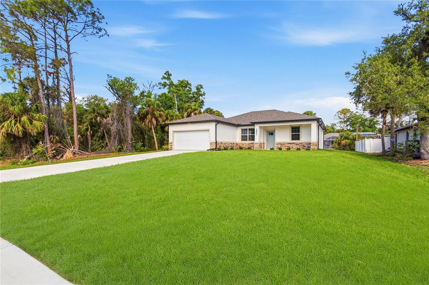 Here it is! A new construction home with CITY WATER  in North Port and no HOA! You'll love the location-near lots of shopping, medical, parks and more! This affordable new home is ready now!  This is just the one you’ve been looking for.   The Acosta floor plan has a great layout with an open and versatile floor plan. The home features 4 bedrooms, 2 full bathrooms, a formal dining room, a living room, an open kitchen, and a 2-car garage with 1,810 square feet of living space. The living space is well utilized, with ample room for large households. The high ceilings and interior features will give you the quality and luxury you were looking for in your new home. This home has a split layout with the primary suite on one end and the guest bedrooms on the other. The Primary bedroom has a tray ceiling and large windows that bring in natural light, plus a resort-style primary bathroom with a walk in shower, double vanity, and a large walk-in closet. The living room also receives plenty of natural light and has access to the covered lanai. The great room is open to the kitchen, where you’ll find a large center island for casual meals. The kitchen features stainless steel appliances, Shaker-style cabinets with crown molding, and granite countertops. The dining room is at the front of the home, with a nice size window providing even more natural light. The home includes luxury vinyl flooring throughout for durability and comfort. You’ll love these floors—easy to maintain and a trending design element in new homes. Other features include Shaker-style cabinets with hardware and granite countertops in the bathroom, tiled walls in the owner’s shower, and a tiled shower floor, a garage door opener, R38 insulation, 16 SEER AC unit and more. Take advantage of the seller’s warranty when purchasing this home. Check out any of our other homes under construction. We have a variety of locations and color schemes for you to choose from.