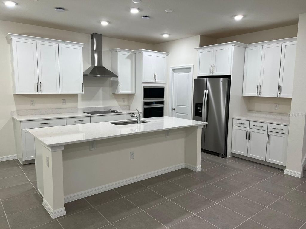 Photo of 1756 Stamen Drive, Kissimmee, FL 34744 (MLS # TB8475839)