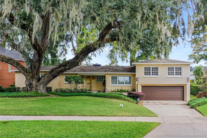 Welcome to this extraordinary lakeside retreat, a true masterpiece of luxury living, perfectly situated on the serene shores of private Lake Sue within the highly sought-after Rose Isle neighborhood. Whether you want to move in and put your own design flair on the current home or tear it down and build custom, this location will appeal to even the most discerning of homeowners. As you enter the inviting foyer, you'll immediately be enveloped in the elegance and charm that define this remarkable home. The formal living room, graced by a wood-burning fireplace, provides a cozy haven for relaxation. Adjacent to it is the formal dining room and a glass-enclosed sunroom, accessible through French doors, offering breathtaking views of the expansive Lake Sue. For those with a passion for culinary excellence, the chef's kitchen is a dream come true. Stunning granite countertops, custom cabinets, and a convenient wine fridge are just the beginning. The adjacent eat-in kitchen area and breakfast bar provide versatile dining options. Furthermore, the main level encompasses a delightful sitting room with built-in bookcases, along with a built-in desk area that provides more of those awe-inspiring water views. Your master suite is a true sanctuary, with a wall of windows overlooking the backyard showcasing panoramic lake views. The en-suite master bathroom has been tastefully updated with a newly re-tiled shower, dual sinks, and a walk-in closet that fulfills your every storage need. On the second level, you'll discover three generously sized bedrooms. Two of the bedrooms share a well-appointed dual bathroom, all of which feature spacious closets. Descend to the lowest level, where the two-car garage resides, and explore a spacious laundry room, a storage room, and a massive bonus room that is the ideal multi-purpose space. This area features access to the backyard and glistening lake, offering endless possibilities for recreation and relaxation. The recently rebuilt composite dock includes an electric lift - an ideal feature for boat enthusiasts. A seawall safeguards your backyard from flooding and erosion. This a unique opportunity to own a piece of paradise with no public lake access, ensuring a truly exclusive and peaceful retreat. Enjoy picturesque moments on the charming patio, embellished with brick pavers. A wonderful spot to grill, relax and take in your spectacular surroundings. Throughout the entire residence, you’ll find unique elements such as crown molding and plantation shutters, these exquisite details elevate the overall aesthetic and add a touch of sophistication that truly sets this home apart. Attached is a comprehensive list of the extensive updates this home has undergone over the years, including re-plumbing and re-wiring. Nestled in the heart of a top-rated school district, this location offers unparalleled convenience to Winter Park, College Park, Baldwin Park and downtown Orlando. Don't miss this opportunity to experience the quintessential lakefront lifestyle in the current home or build your own custom property on this amazing lot. 
<iframe width='853' height='480' src='https://my.matterport.com/show/?m=oPBigEAoq3v' frameborder='0' allowfullscreen allow='xr-spatial-tracking'></iframe>