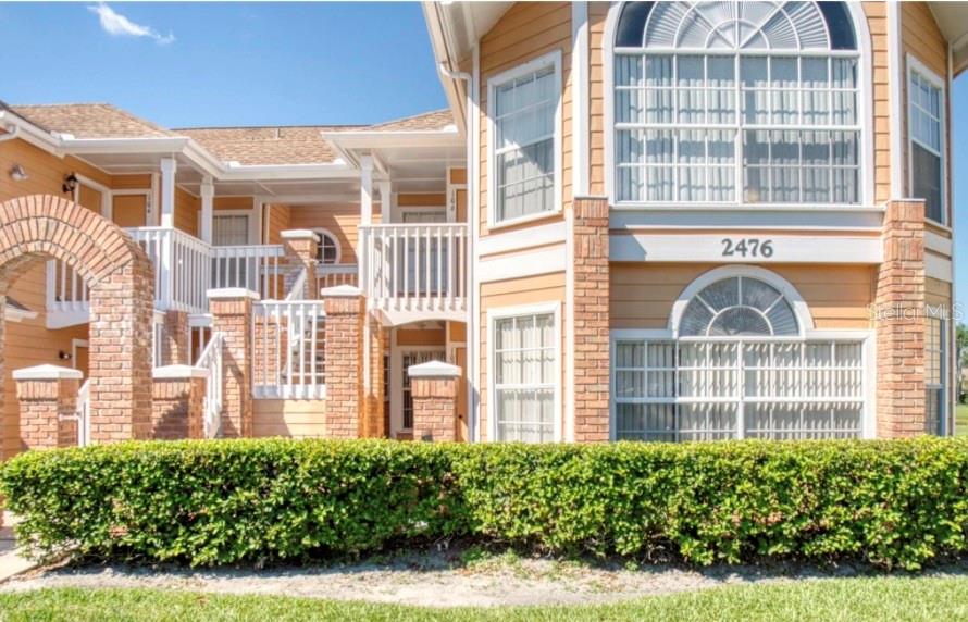 Photo of 2476 Sweetwater Club Circle #107, Kissimmee, FL 34746 (MLS # S5158800)