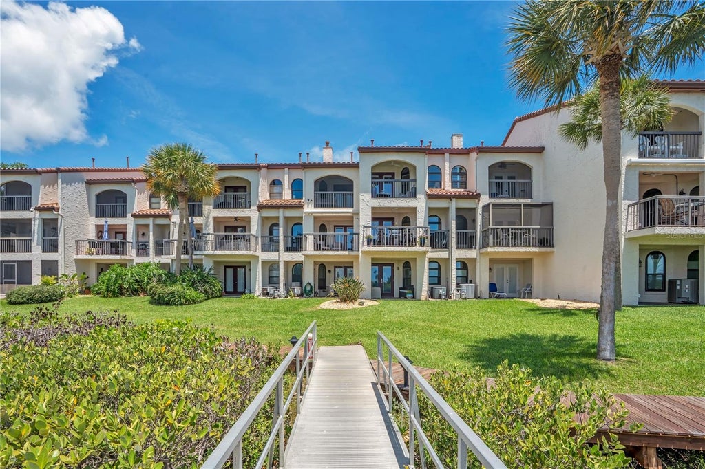 Photo of 150 Marina Bay Drive, New Smyrna Beach, FL 32169 (MLS # NS1088476)